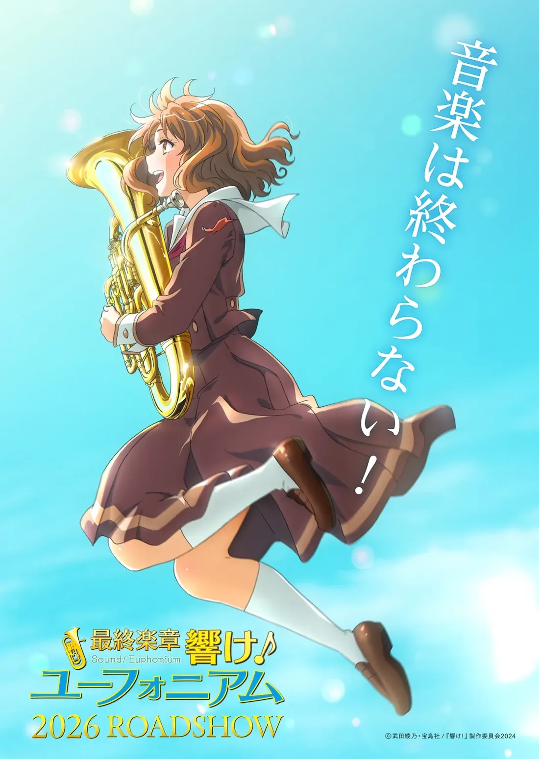 Kumiko Jumping and holding a euphonium with in a blue sky
